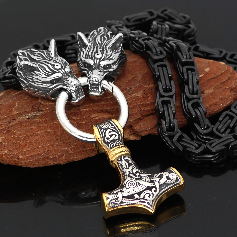 Collier viking Fenrir noir avec son pendentif Mjöllnir argenté et doré Collier viking Fenrir noir avec son pendentif Mjöllnir argenté et doré