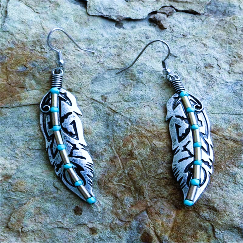 Boucles d’oreilles plumes Boucles d’oreilles plumes